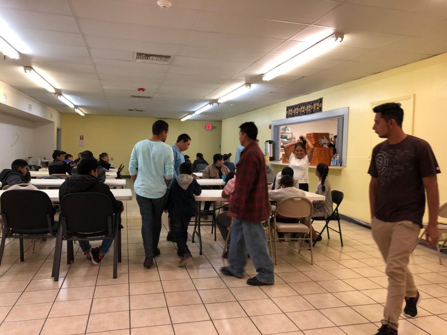Migrants received pizza for dinner that Loretto brought to the annunciation house with the help of the Loretto seniors.  Photo courtesy of Regina Deandar.