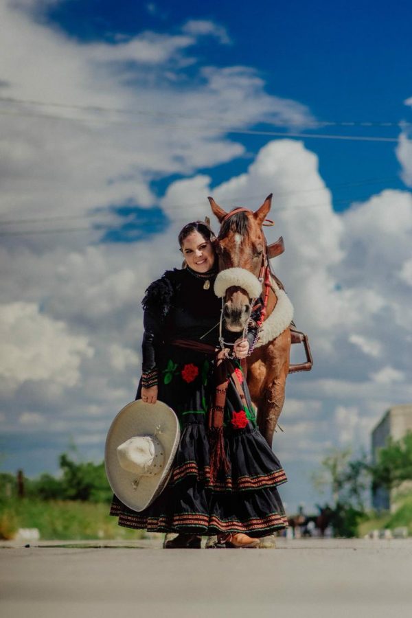 Loretto junior Alexis Diaz as escaramuza with her horse Mechudo.  Photo courtesy of Alexis Diaz.