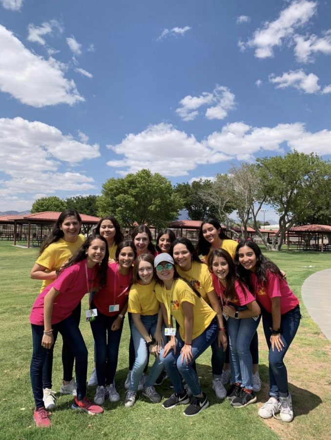 Biggies and littles enjoying their time at Biggs Park.  Freshmen wearing pink and the seniors yellow,  representing their class colors. Photo courtesy of Julieta Alarcon.