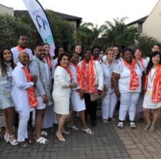 The U.S. delegation poses for a picture the night of the cultural parade. The U.S. delegation wore all white as a symbol of the suffragette movement. Photo courtesy of the YWCA U.S. delegation.