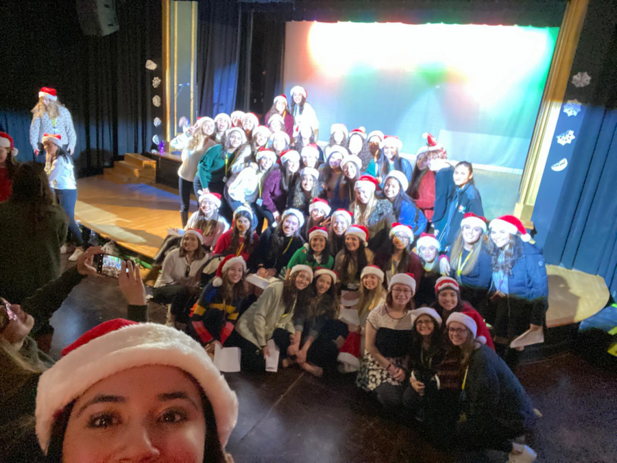 Lorettos seniors taking a selfie after their performance. They completed their last Christmas assembly and one of many traditions. Photo courtesy of Alejandra Urbina.