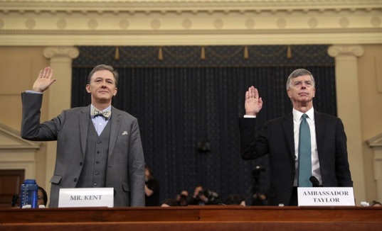 William Taylor, U.S. ambassador to Ukraine (right), and George Kent, assistant in Eurasian affairs (left), testify in the first impeachment hearings held on November 13, 2019. Their testimonies and the testimonies of other U.S. officials were used in drafting the president’s articles of impeachment. Photo courtesy of the Salt Lake Tribune.
