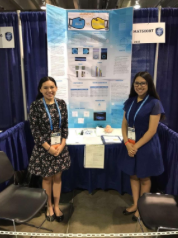 Dinorah Perez [left] and Samantha Perez [right] in front of their winning board from the 2018 Intel International Science and Engineering Fair. Photo courtesy of Samantha Perez.
