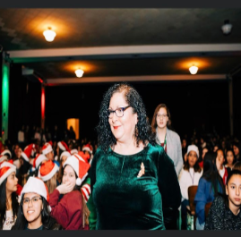 Ms. Franco at last years Christmas assembly. Ms. Franco is the junior head sponsor and coordinates the various junior activities. Photo courtesy of the Loretto Academy Facebook. 