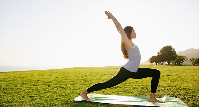 In the photo above we see a woman enjoying nature while doing some yoga. This represents Thursday of Loosen up Loretto.