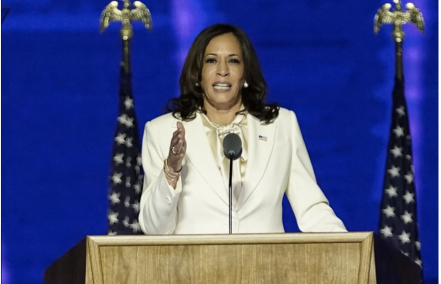 Kamala Harris gives her first speech after the democratic victory. He white suffragette suit representing another milestone women in America have passed. 