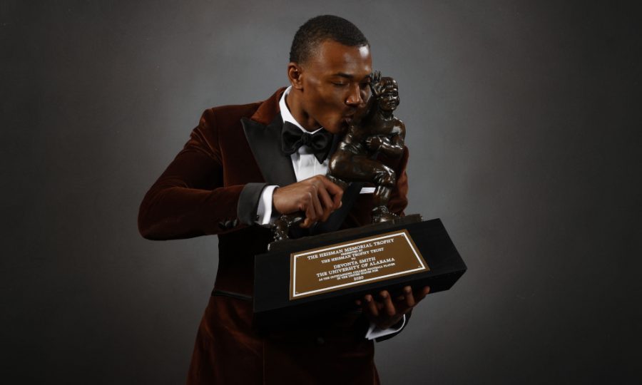 DeVonta Smith kisses the Heisman trophy he was awarded for the 2020-2021’s season. Smith was given a photoshoot that consisted of over 20 photos with his new accomplishment.