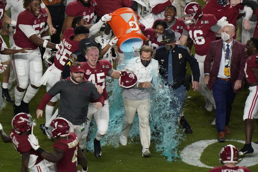 Alabama+players+drench+their+coach%2C+Nick+Saban+Jr.%2C+in+Gatorade+after+the+game.+The+team+and+fans+cheered+and+celebrated+the+win+the+rest+of+the+night.+