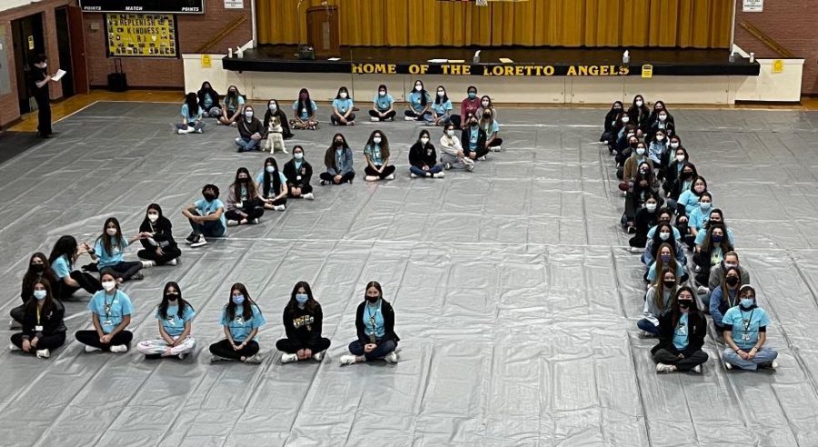The class of 2021 doing the traditional picture of their graduating number. While some Loretto sisters are missing, the sisterhood is ever-present!