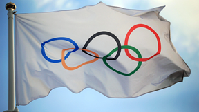 The five rings hang on the flag to represent the colors of the Olympics. After much consideration, the 2020 Olympic Games will go off in Tokyo this summer.
