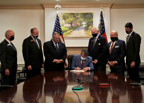 Gov. Kemp signs a suppression bill into law. This photo is now the poster of modern-day Jim Crow attempts to disenfranchise People of Color. 