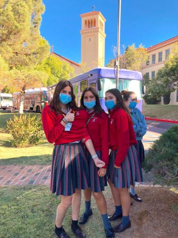 Loretto Academy juniors (Eloisa Urrea and Mariajose Florido) and senior (Jimena Vega) proudly stand in front of the Vitalant blood drive at Loretto Academy.  This took place Thursday, October 28, 2021.