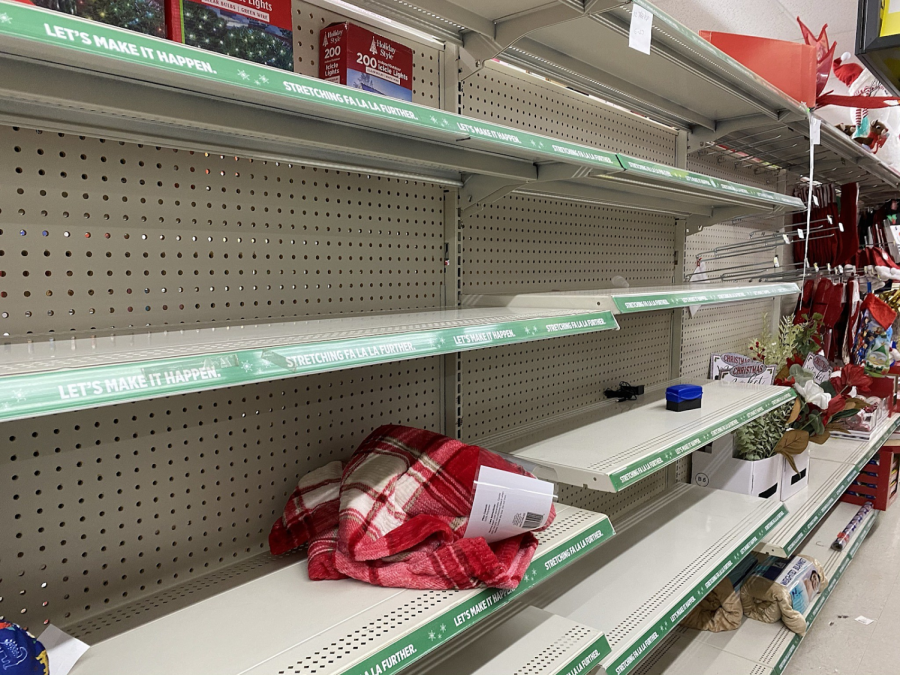 Shelves are empty at a Dollar General in Cedar Valley, Iowa. This Christmas season, shoppers are experiencing shipping delays and increased prices. Photo courtesy of Shawn McKenna