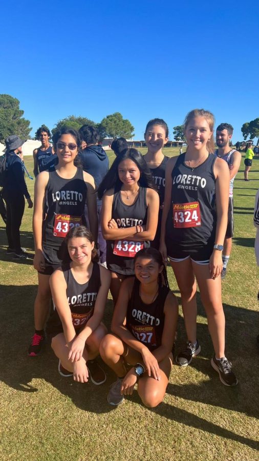 Loretto%E2%80%99s+cross+country+team+poses+for+a+picture+at+a+meet.+Pictured+are%3A+seniors+Astryd+Payne+and+Faith+Tolentino%3B+sophomores+Isabella+Hallal%2C+Mia+Moreno%2C+and+Grace+Tolentino%3B+and+freshman+Iskra+Salas.+Photo+courtesy+of+Joe+Ramirez