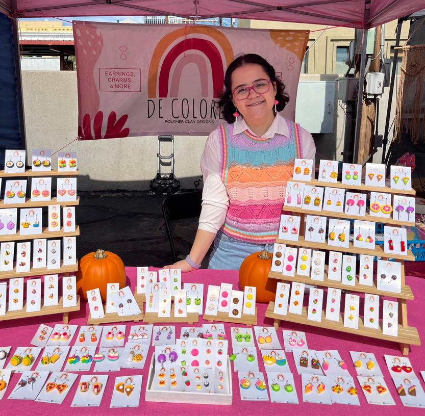 Elisa Camacho is at El Paso’s “Chalk the Block” selling clay earrings and charms. She was selected as “Angel in the Spotlight” for her artistic contributions to the El Paso Community. Photo courtesy of Elisa Camacho