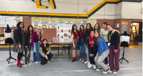 National Art Honor Society in their booth to introduce their club. Members volunteered to run the booth to showcase what the society does to parents. Photo courtesy of Zuleika Botello.