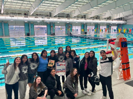 The Loretto swim team poses after winning first place in their division. They will be competing again during state. Photo courtesy of Sofia Ruiz del Hoyo.