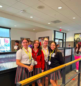 Four students wait in line eager to order off the Chick-Fil-A fundraiser at Loretto’s Spirit Night. The benefits of the event will be donated to fix and prioritize the school’s issues. Loretto students, from left to right, Marialuisa Urias, Bárbara Urias, Renata Muñoz, and Emilia Garcia. Photo courtesy of Melissa Casale.