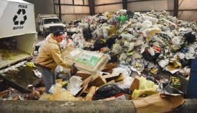 A recycling center in Raleigh, NC sorts tons of waste to be processed based on its recyclability and sent to be repurposed. Education systems should encourage students to learn the importance of recycling and practice it at home and at school. Photo courtesy of Wake County Government.