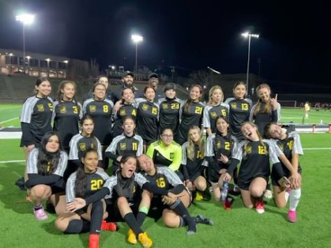 Loretto’s soccer team poses for a photo after a game. This years team consisted of 22 girls. Photo courtesy of Mr. Nieto