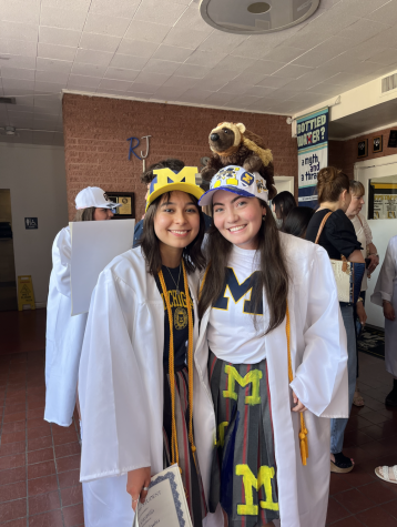 Two top ten percent seniors wearing
University of Michigan attire. From left 
to right: Crista Castillo and Jayne Nowak. 
Photo courtesy of Mia Montelongo 
