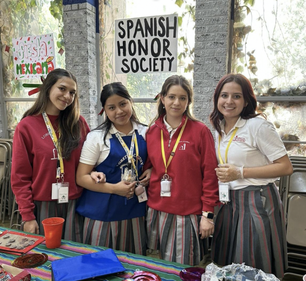(From left to right) Paulina Garcia, Emily Aguilar, Carolina Terrazas, and Valeria Portillo working the Fiesta Mexicana. Photo courtesy of Emily Aguilar
