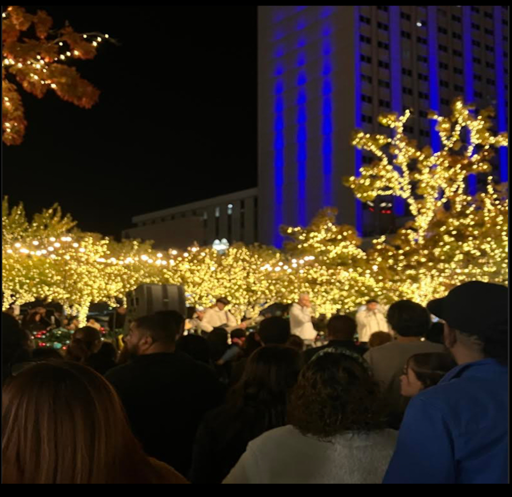 The lighted tress during this year’s El Paso Winterfest. The community is gathered around the San Jacinto Plaza listening to local bands play.