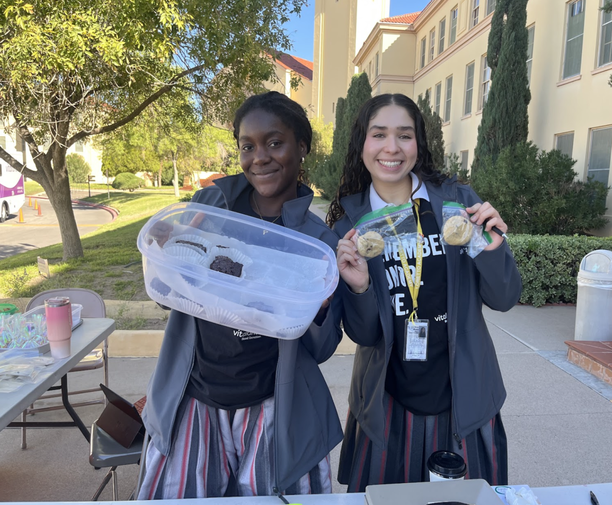 Members of the Student Council are shown in front of Loretto Academy selling baked goods to donors. Pictured are Precious Pieri on the left and Avabella Muñoz on the right. Photo courtesy of Viviana Liano.
