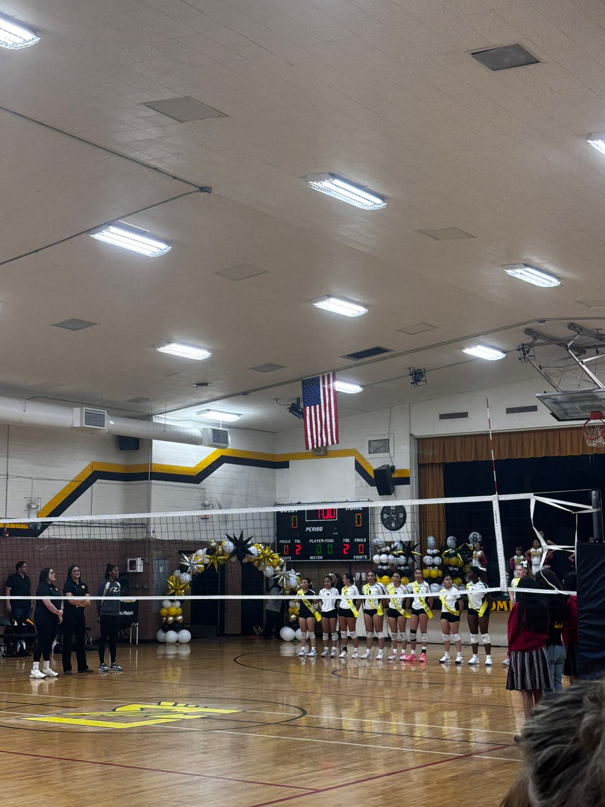 The varsity team at the beginning of the game, waiting to be introduced. The last home game for the senior players. Photo courtesy of Maria Reyes. 