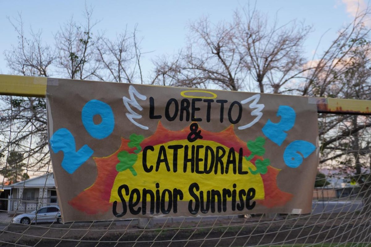 Loretto and Cathedral Senior Sunrise banner in the soccer field. Senior Sunrise is a yearly tradition for the seniors to make more memories on campus. Photo courtesy of Eva Alondra Martinez.