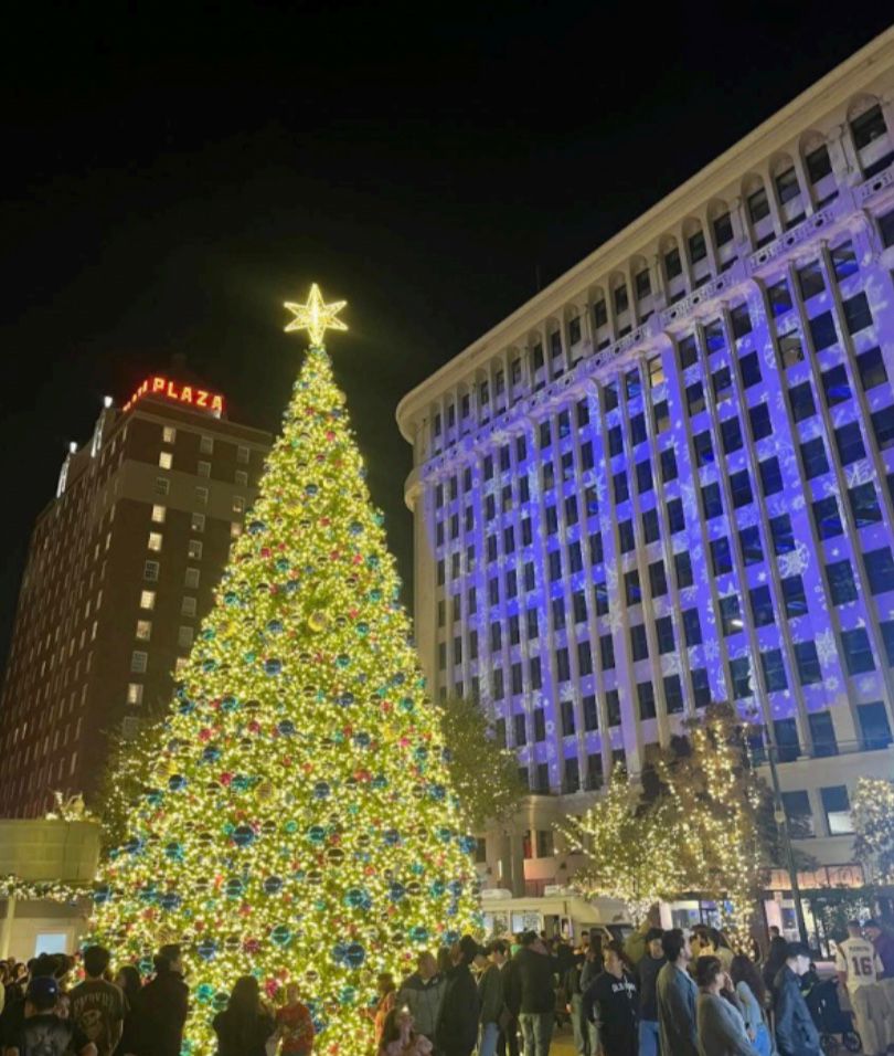 The bright Christmas tree shines as people take photos around it and admire the colorful ornaments. Photo courtesy of Lyle Skillern.