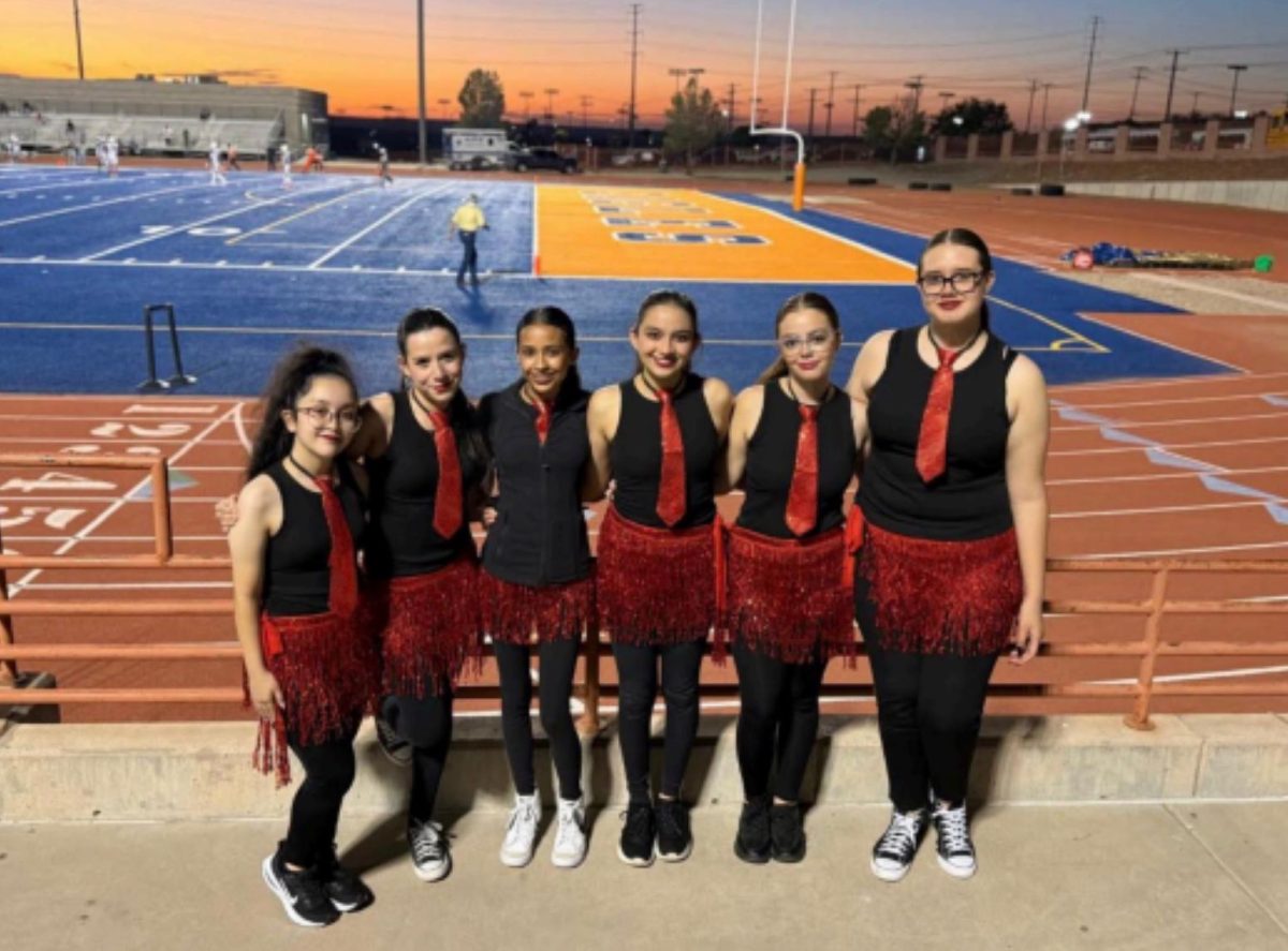 Orchesis members posing before their
performance at senior night. Photo courtesy of Madison Ada.
