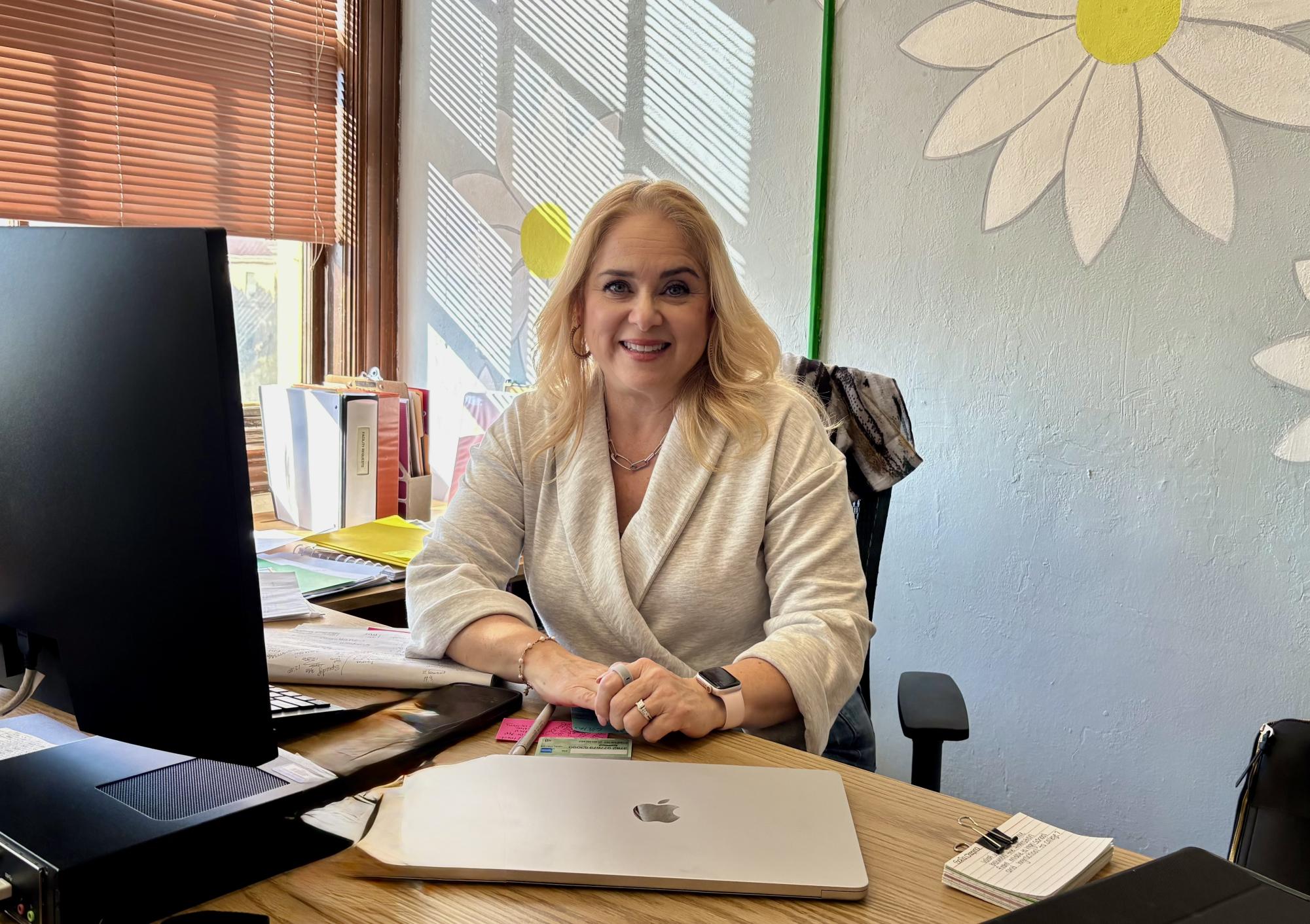 New Student Activities Coordinator Mrs. Munoz pictured in her office on the third floor. Her welcoming nature invites all students to express their creativity and leadership skills. Photo courtesy of Olivia Montelongo. 