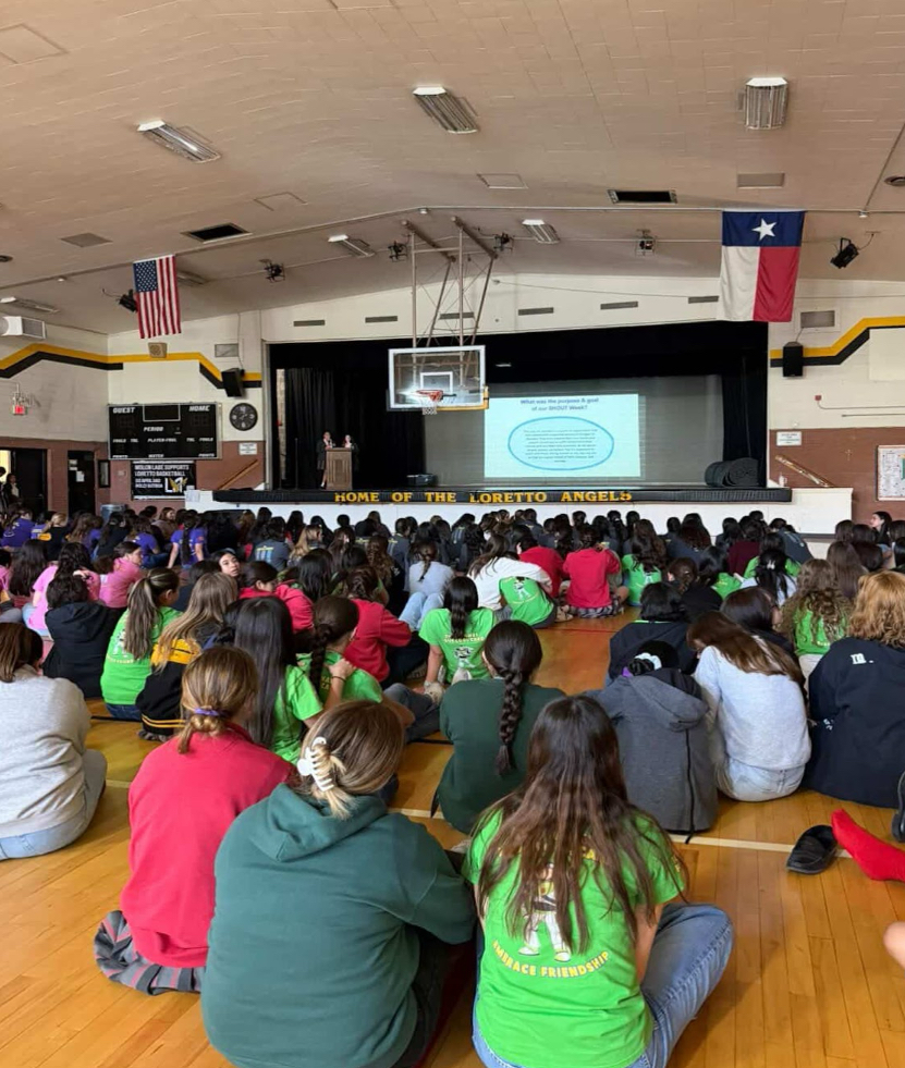 Students across the grade levels sit down together at the assembly on the last day of SHOUT week. They listen to the closing presentation, made by the student council. Photo courtesy of Montserrat Reyes.