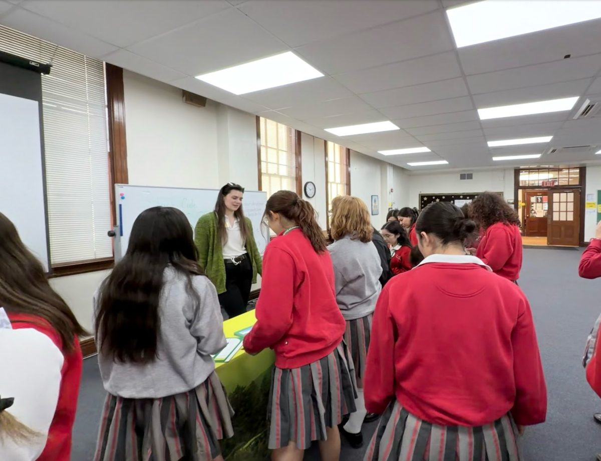 Students are browsing the different universities' booths. They ask the representatives different questions about the school. Photo courtesy of Viviana Liano.