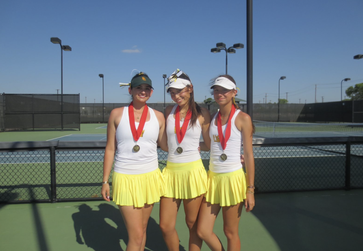 Loretto Academy Tennis athletes taking on regionals in Dallas Texas. Their skill and technique stood out from the other competitors at regionals. Photo courtesy of Emma Terrazas.