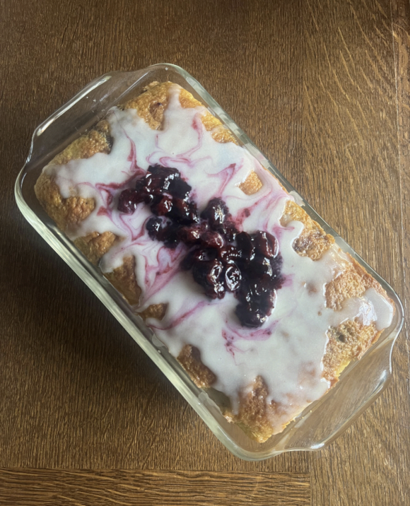 Lemon Blueberry cake with cream cheese frosting and blueberries on top. Photo credit of Lyle Skillern.
