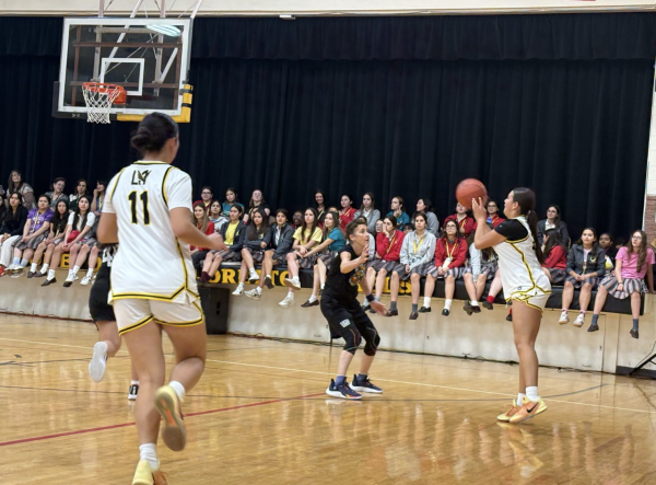 Battle of ages: staff vs. varsity showdown