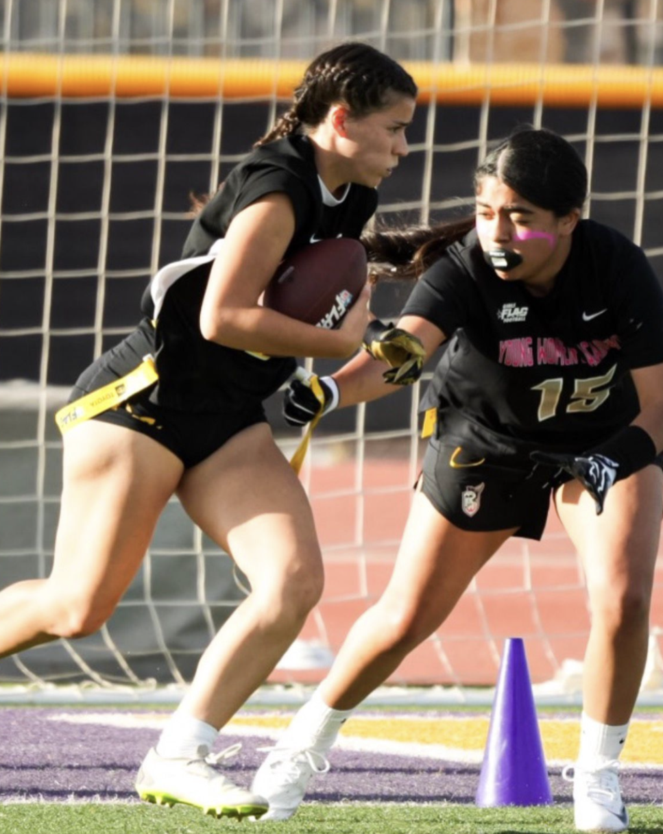 Senior Doryan Nassri sprints with the ball in hand. She is a valuable player to the team as she is also a part of the soccer team. Photo courtesy of Veronica Eve.